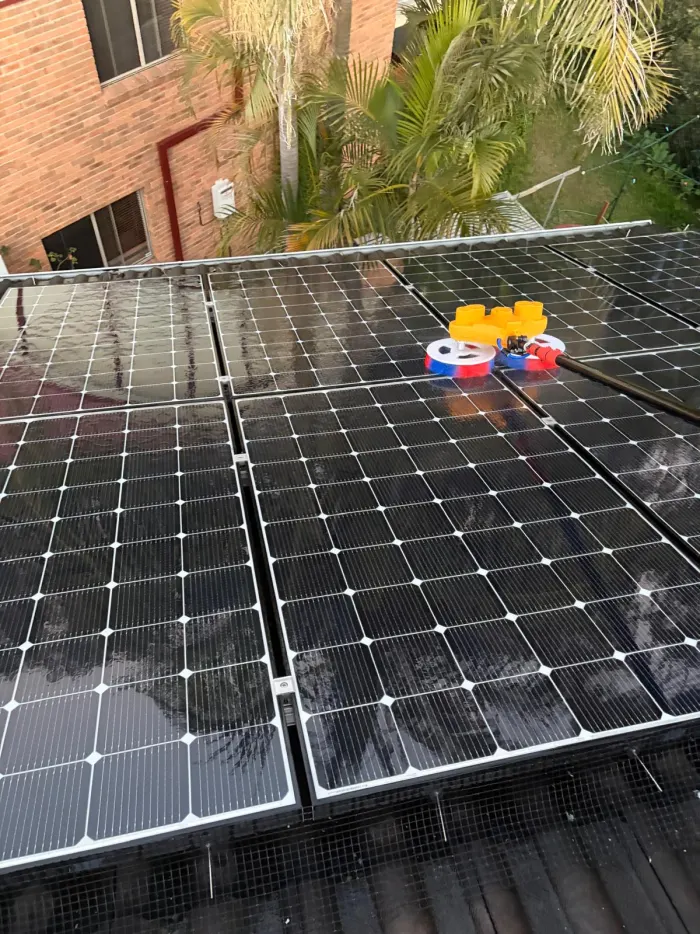 Solar panels wet during a purified-water cleaning