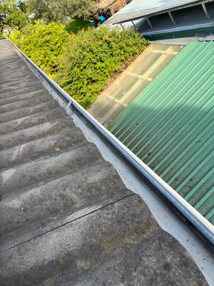 Roof gutter after leaves and debris have been cleared
